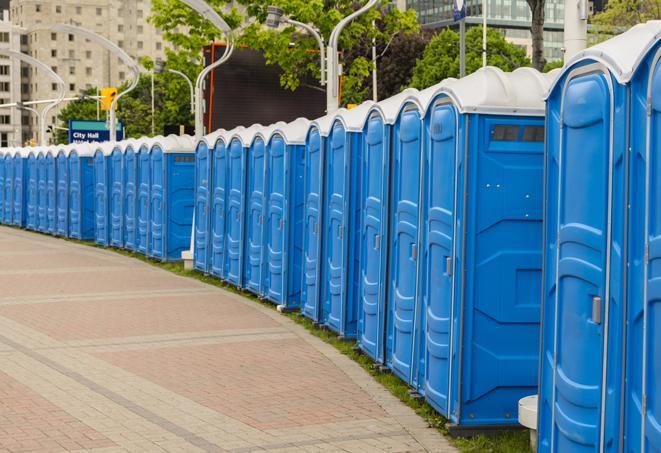 a row of portable restrooms for a special event, ensuring guests have access to clean facilities in Bloomfield NJ